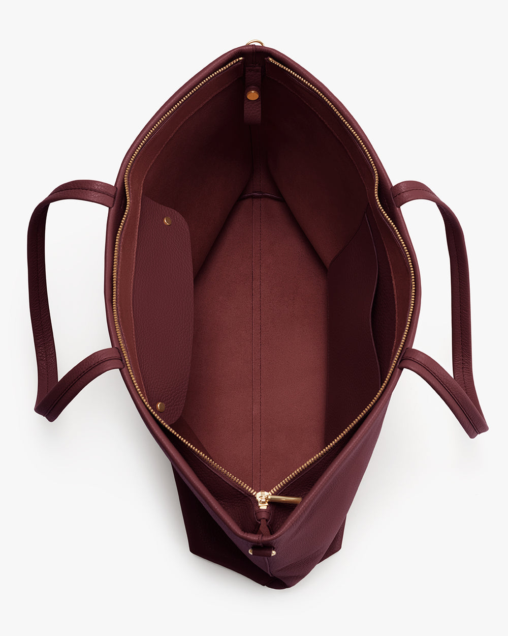 Open tote bag with two straps and a zippered pocket inside.