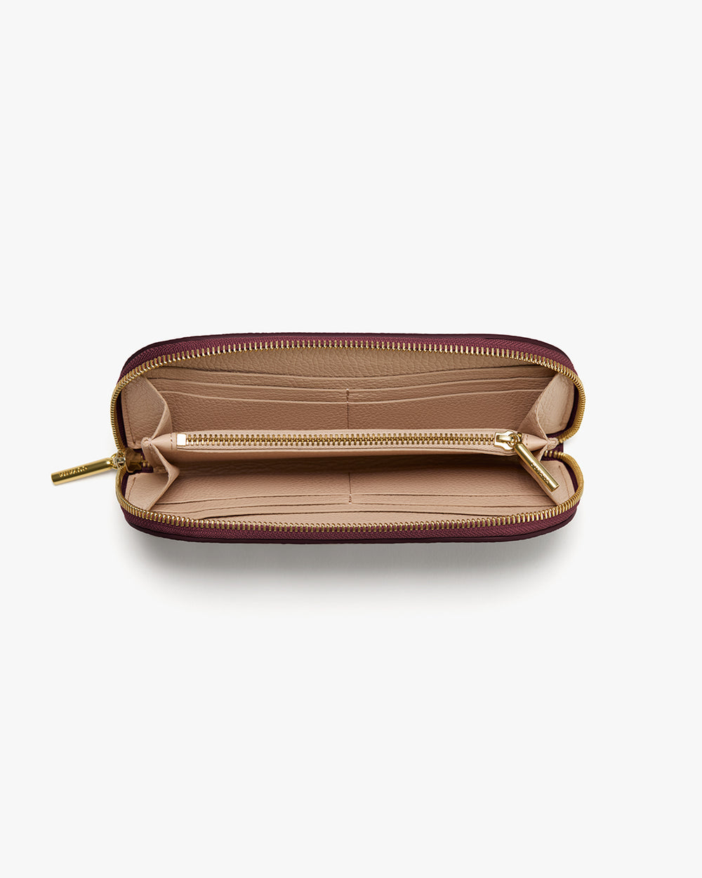 Curved Zip Wallet Open wallet with multiple compartments and zip closure.