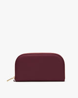 Rectangular wallet with a zipper along the top edge.