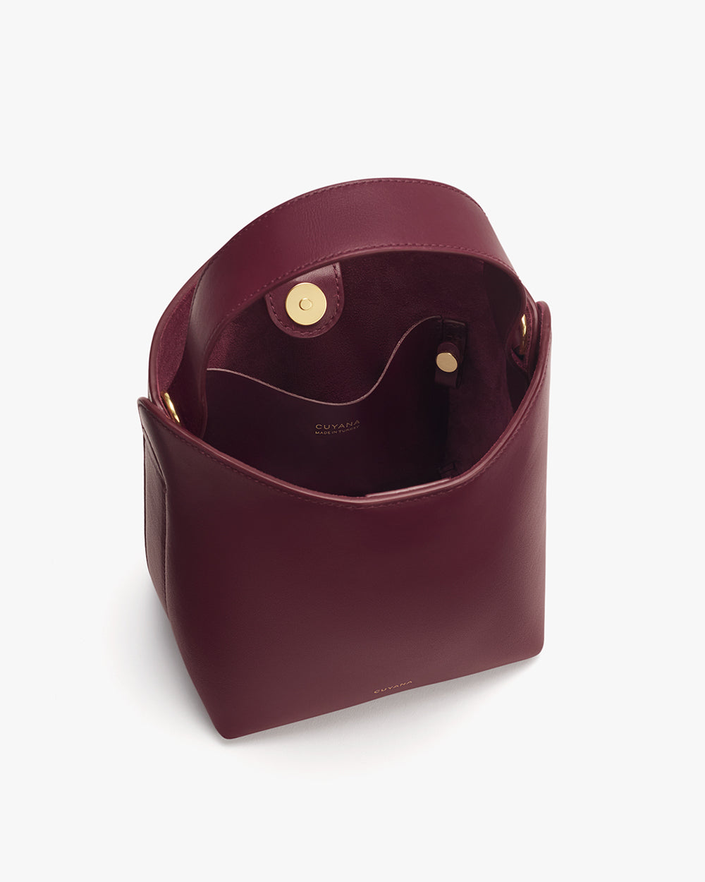 Mini Linea Bucket Bag Small open tote bag with a snap closure and inner compartments.