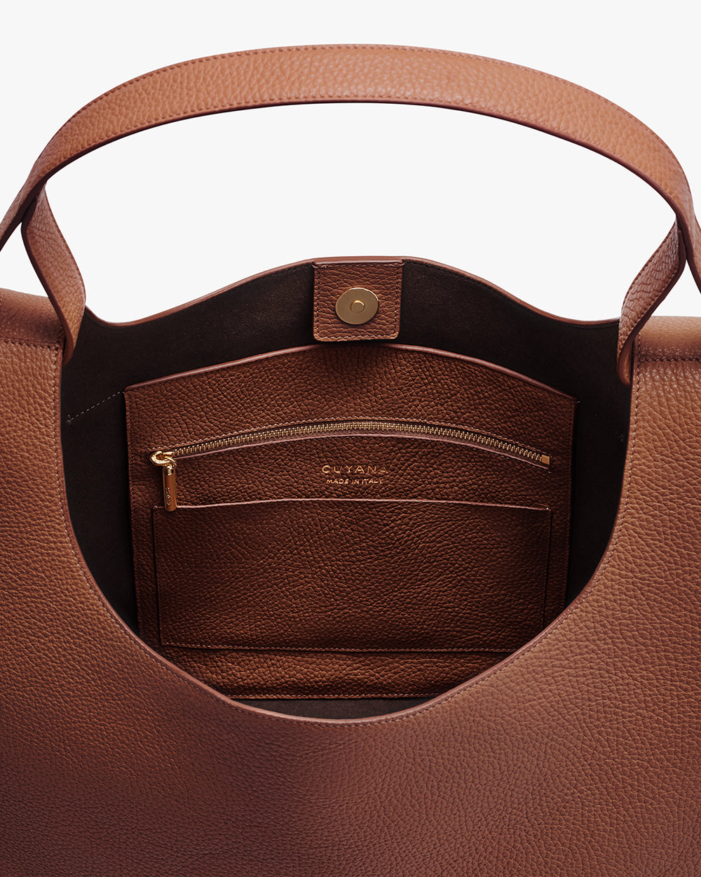 Oversized Double Loop Bag Open travel bag showing inner zippered pocket and slot pocket.