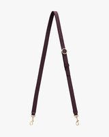 Adjustable strap with metal clasps on each end