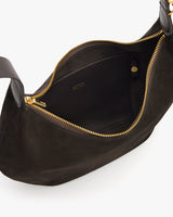 Open handbag with a zippered pocket inside.