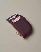 Small half-moon coin purse with zipper and card slots