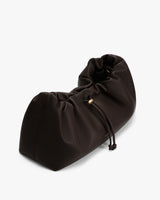 Slouchy bag with drawstring closure and rounded shape.