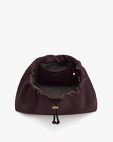 Open bag with a small pouch inside seen from above