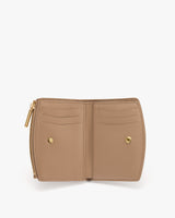 Open wallet with card slots and snap buttons