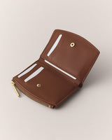 Open wallet with card slots and zipper pouch