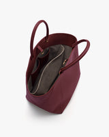 Open tote bag with handles and multiple interior compartments