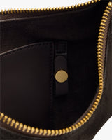 Open bag showing zipper, internal pocket, and a button.