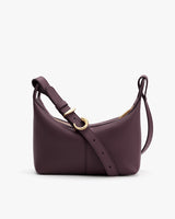 Crossbody bag with adjustable strap.