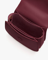 Open handbag with visible compartments and lining