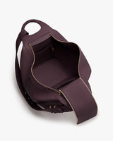 Open tote bag with a wide zippered main compartment.