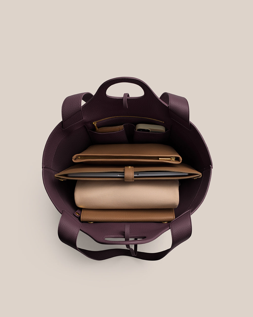 Paloma Tote Top view of open handbag with organized contents inside