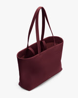 Tote bag with double handles and open top.
