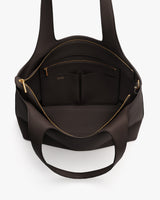 Open tote bag with multiple interior pockets and visible zipper.