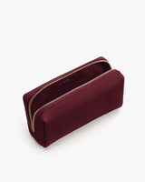 Rectangular zippered pouch, open, showing interior.