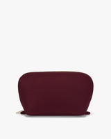 Small rounded pouch with a zipper on top