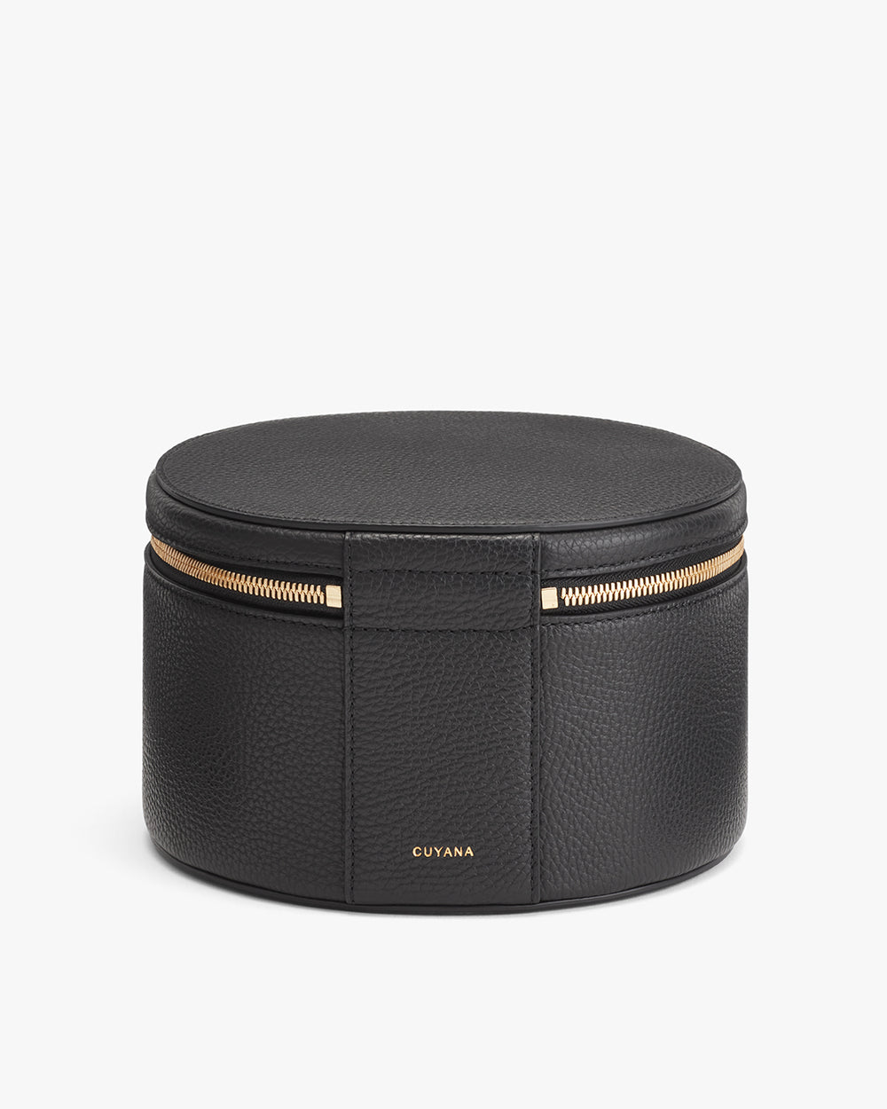 Round jewelry box with zipper on white background.