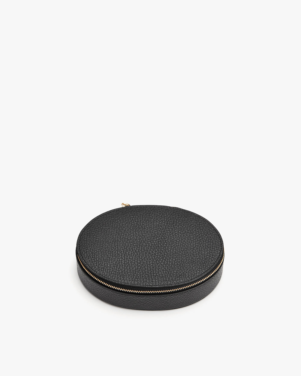 Round zippered case on a solid background