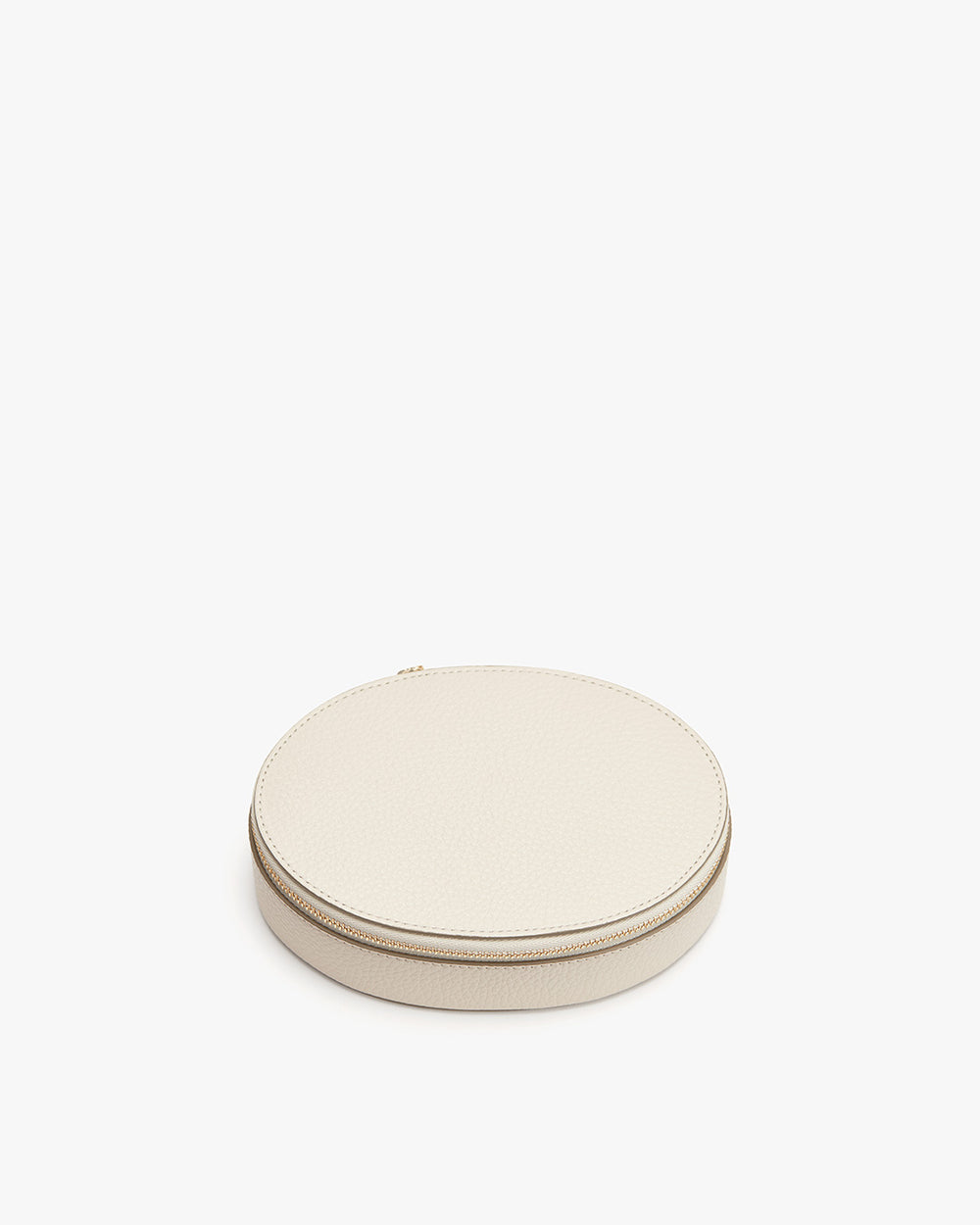 Round zippered case on a plain background