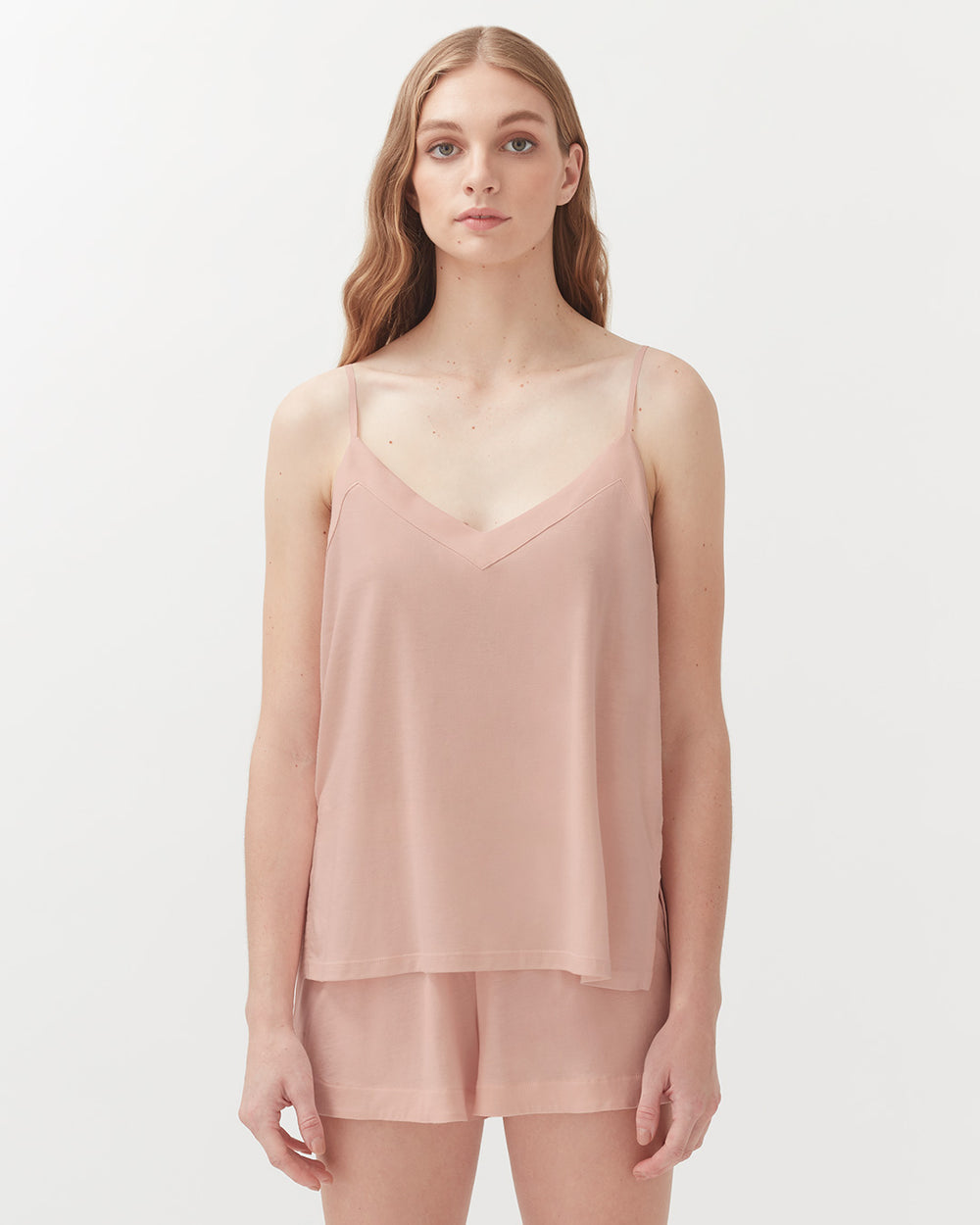 Organic Pima Cami Woman standing in sleeveless top and shorts, facing forward.