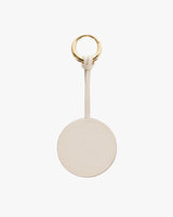 Keychain with a circular tag and a metal ring