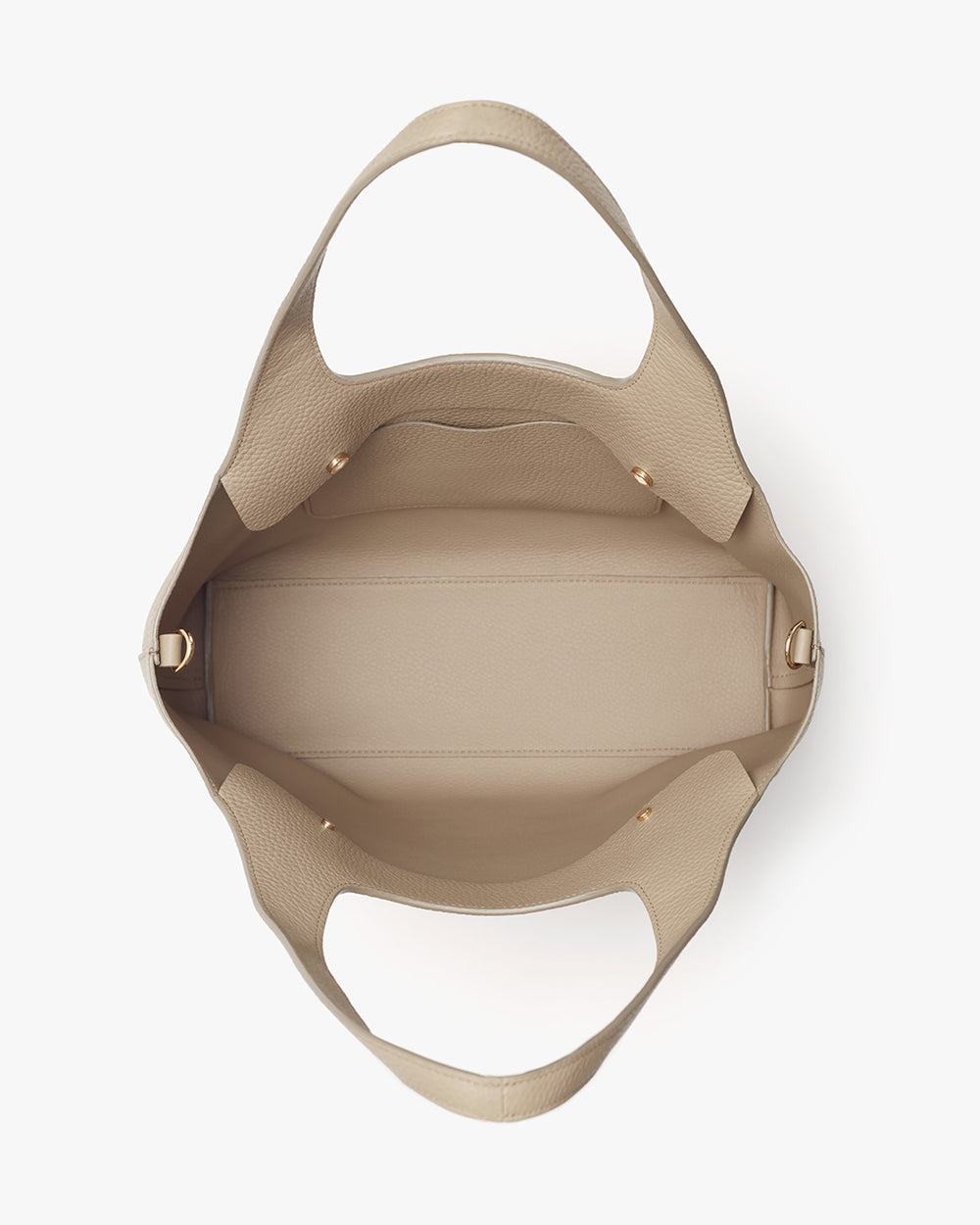 Open handbag viewed from above showing interior and handles.