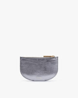 Half-moon shaped small zipper pouch standing upright.