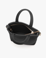 Open handbag with zipper on top and handles.