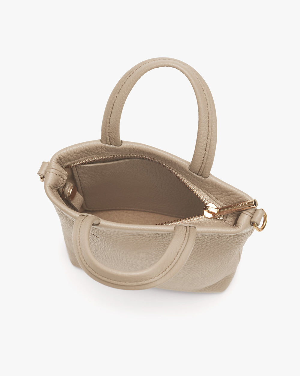 Open handbag with zipper and rounded handles.