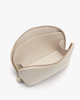 Open small zippered pouch from above showing interior.