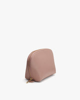 Small cosmetic bag with a zipper on a plain background.