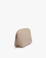 Small upright cosmetic bag with a zipper closure.