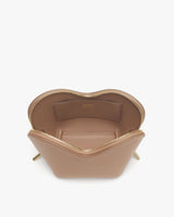 Open purse with visible interior and zipper