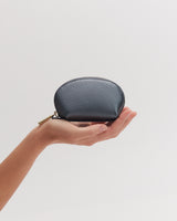 Hand holding a small zippered pouch