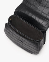Open croc-embossed leather handbag with visible interior.