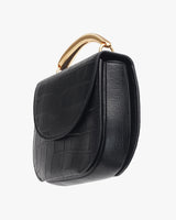 Small handbag with a flap closure and curved handle.