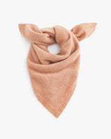 Knotted neck scarf on a plain background
