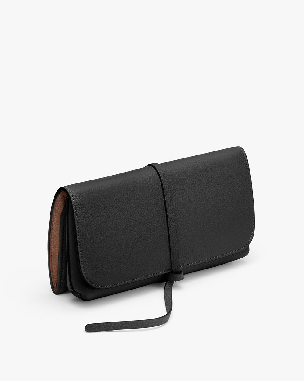 Closed clutch bag with a loop closure on a plain background.