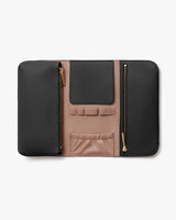 Leather wallet with multiple compartments and zippers on white background.