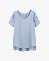 Short-sleeved blouse displayed on a plain background.