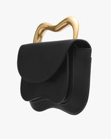 Handbag with wavy design and unique curved handle