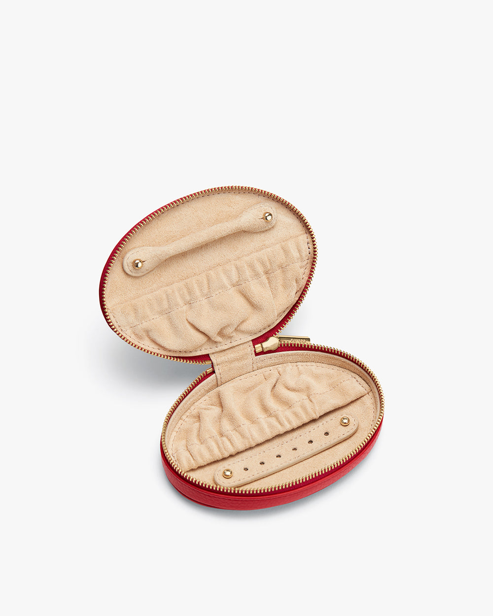 Travel Jewelry Case Open jewelry case with elastic pouch and ring holder inside.