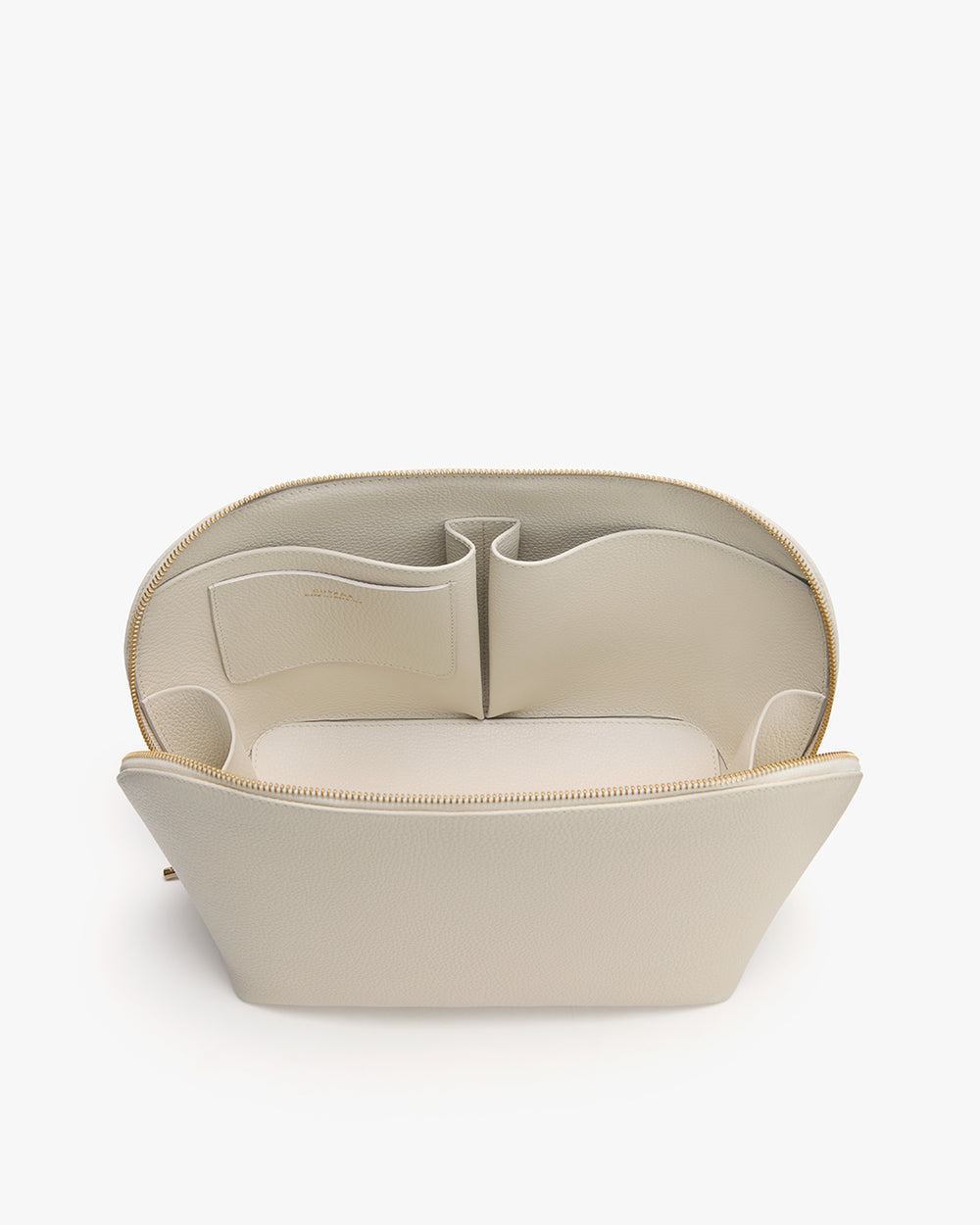 Voyager Travel Case Open pouch with multiple interior compartments.