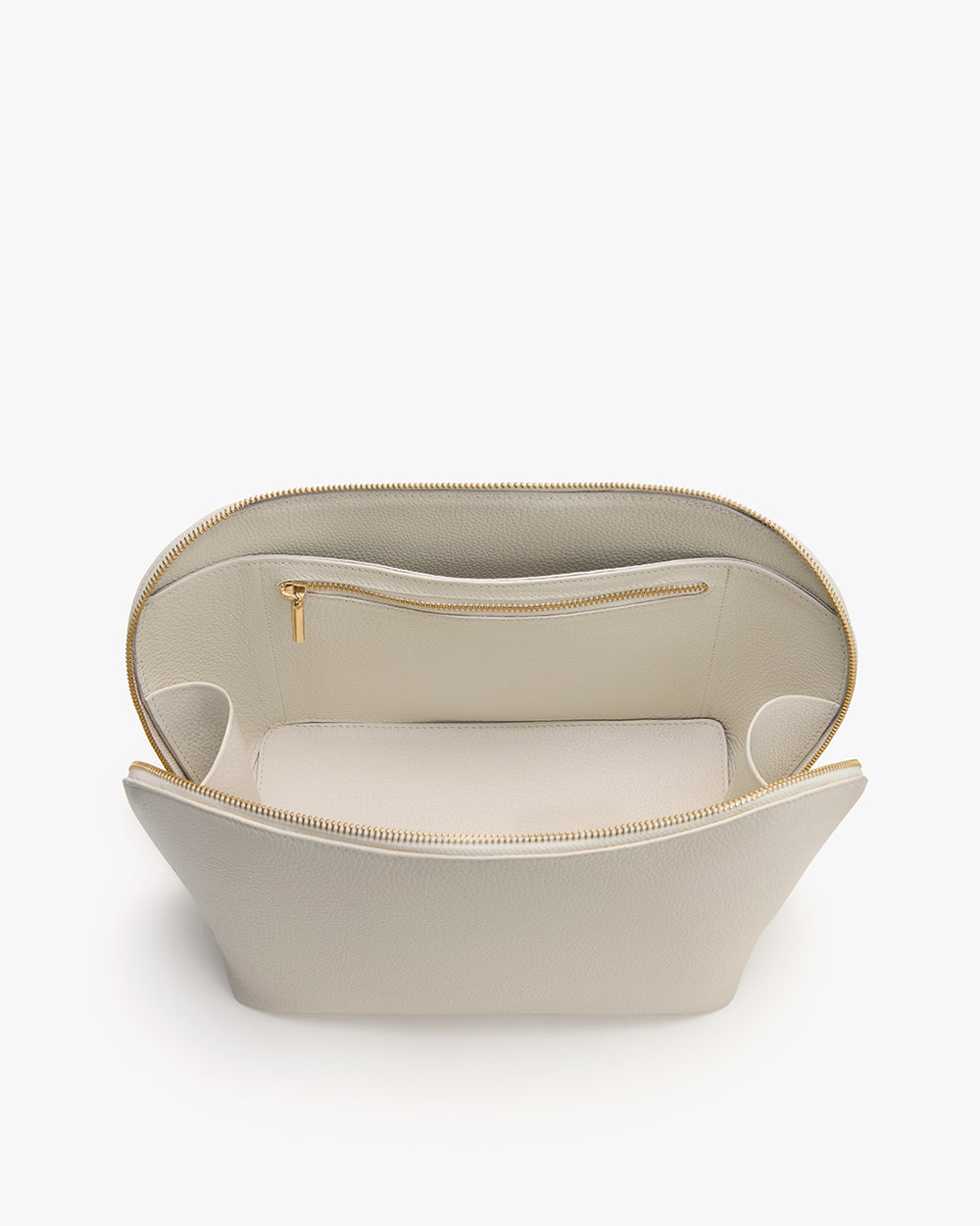 Voyager Travel Case Open pouch with an interior zipper pocket visible