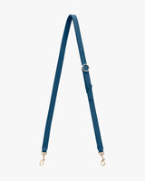 Adjustable shoulder strap with metal clips.