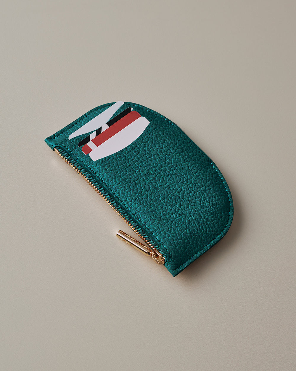 Cardholder Small textured pouch with a zipper and multiple card slots.