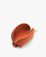 A small open pouch with a zipper and a loop.