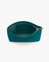 Open zippered pouch with a small interior label.